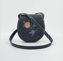 Swooping Swallows Navy Mini Saddle Purse